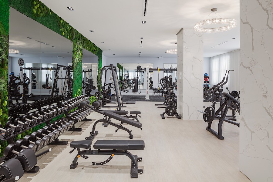 the atlantic apartments fitness center green wall