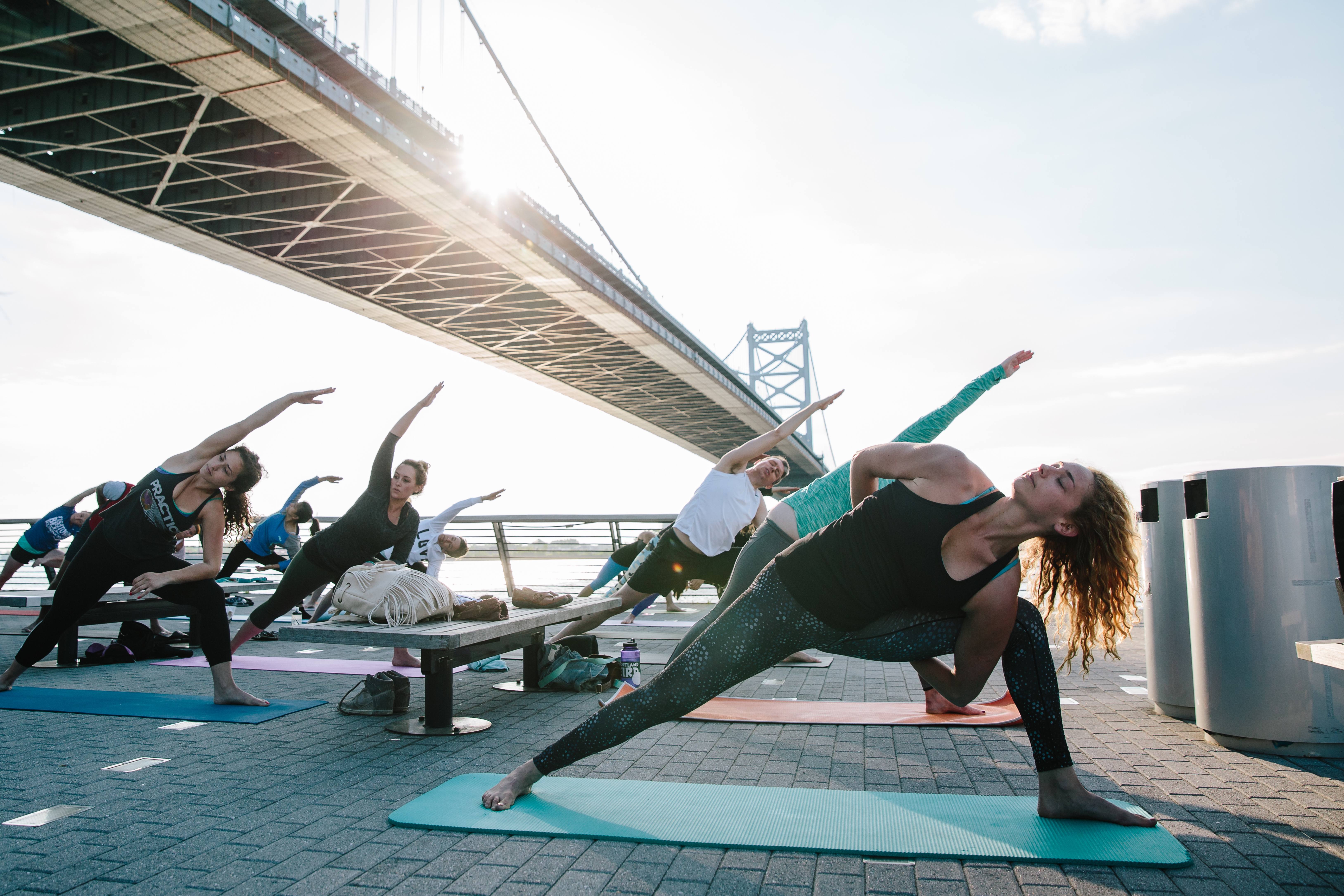 Free Yoga On The Pier Is Returning to the Philly Waterfront