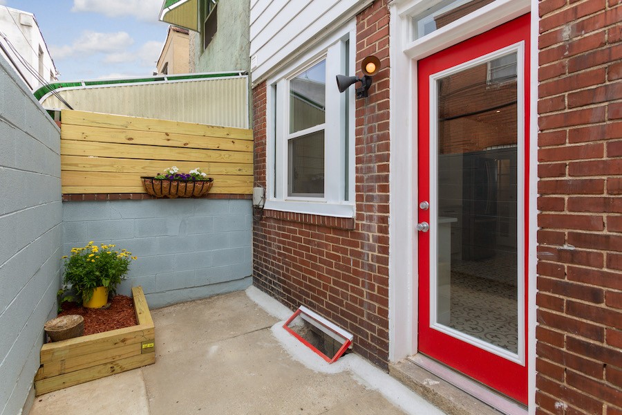 house for sale point breeze rowhouse rehab rear patio