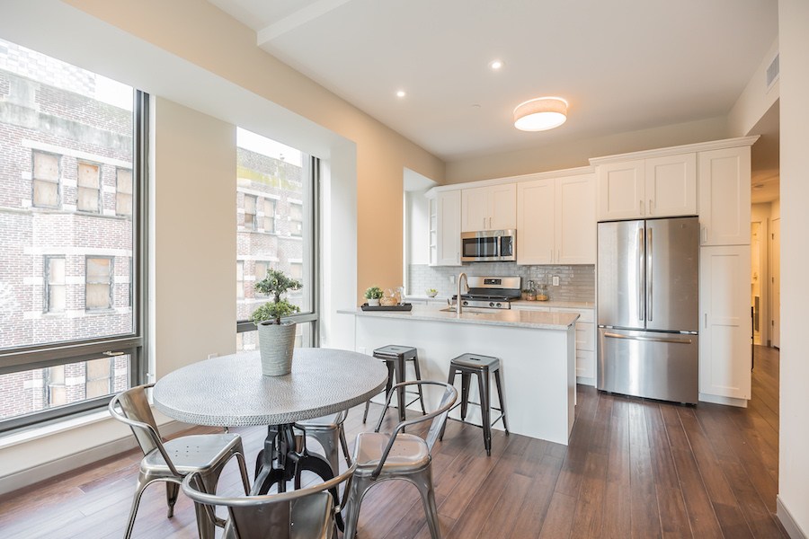 the harper apartment profile model 2br dining room and kitchen