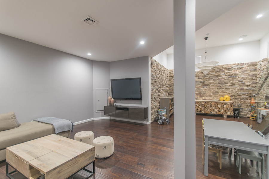 northern liberties designer townhouse media room and playroom