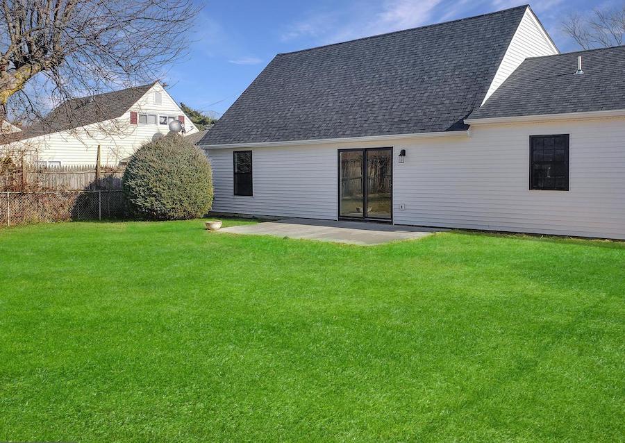 house for sale levittown rebuilt rancher exterior rear