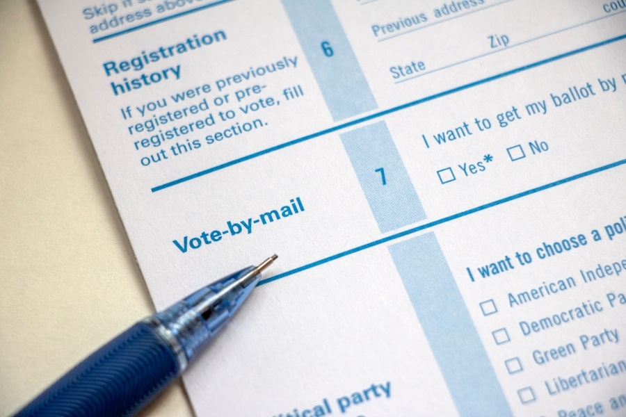 You Should Really Sign Up for a Mail-In Ballot. Here's How to Do It