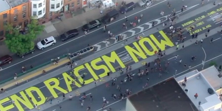 end racism now street art in fishtown