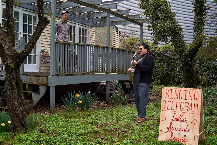 dot levine performing a dottie's serenade service gig in a backyard