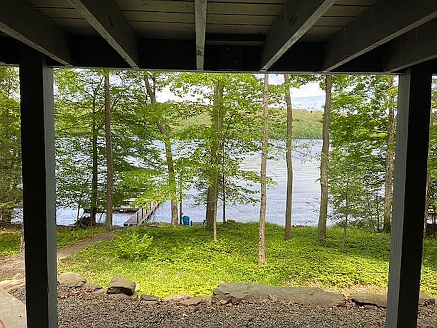 view of lake and dock