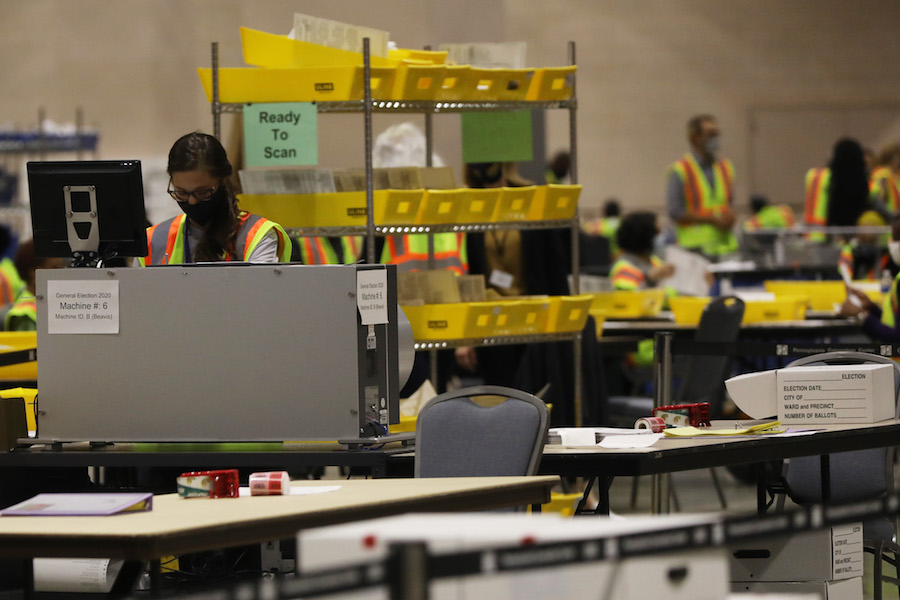 workers count the Philadelphia vote inside the Pennsylvania Convention Center, which will play a big part in the Pennsylvania election results