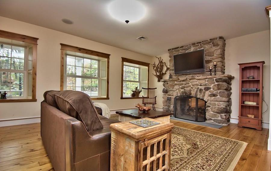 house for sale buck hill falls stone cottage living room