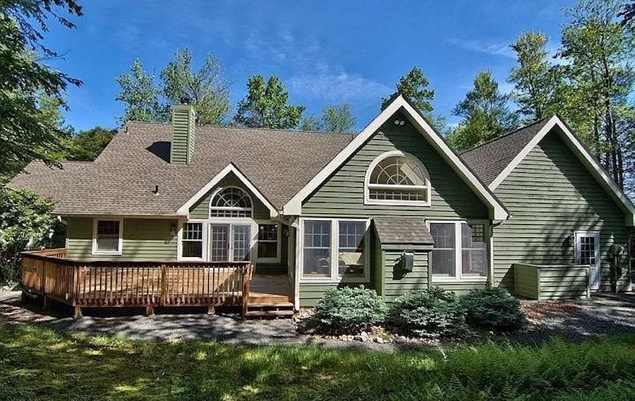 rear elevation and deck in summer