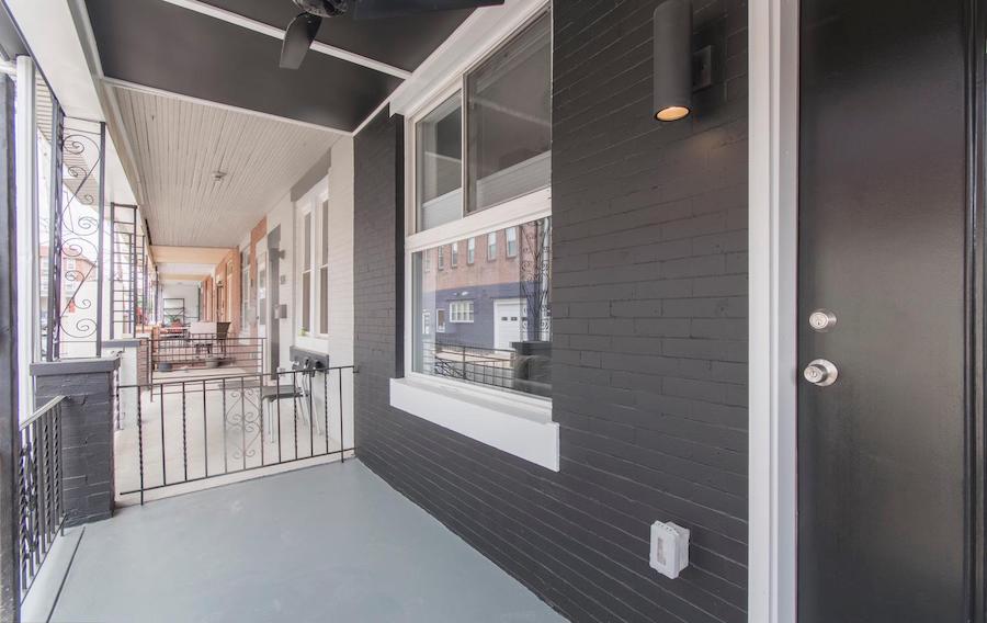house for sale rebuilt walnut hill rowhouse front porch