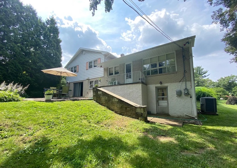 rear elevation and basement entrance