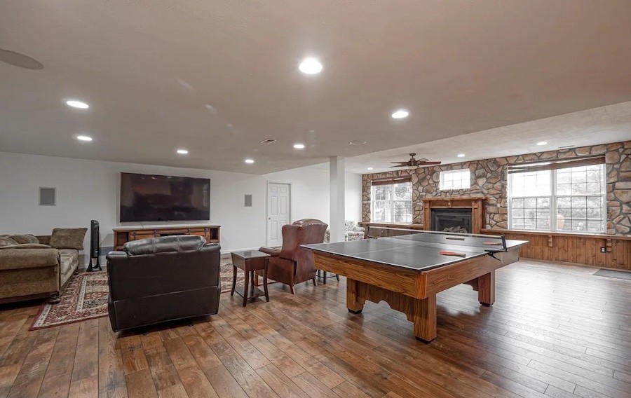 basement media room and fireplace