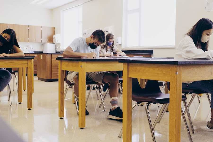 stock photo of students wearing masks in schools, something that is the subject of a lawsuit over the mask mandate in Bucks County schools
