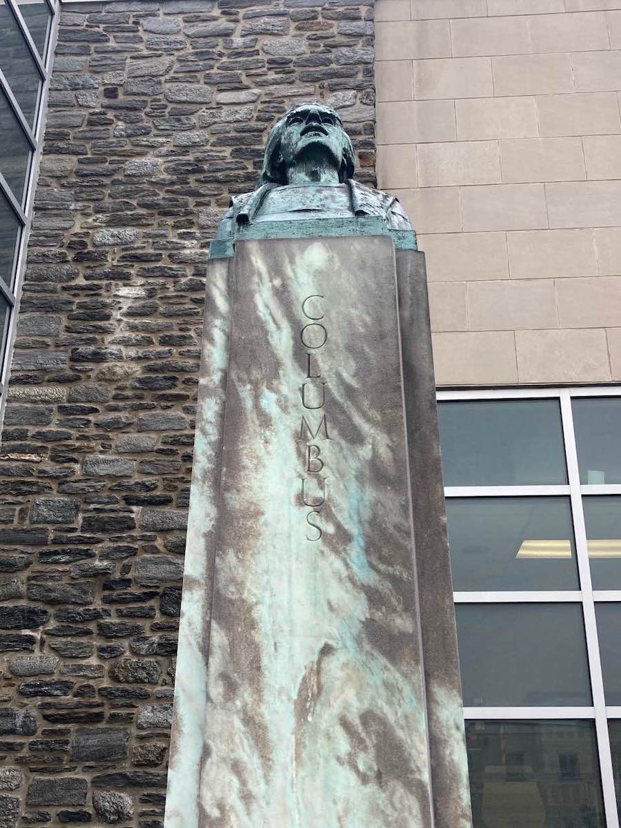 the front of the christopher columbus monument outside the ludington library in bryn mawr