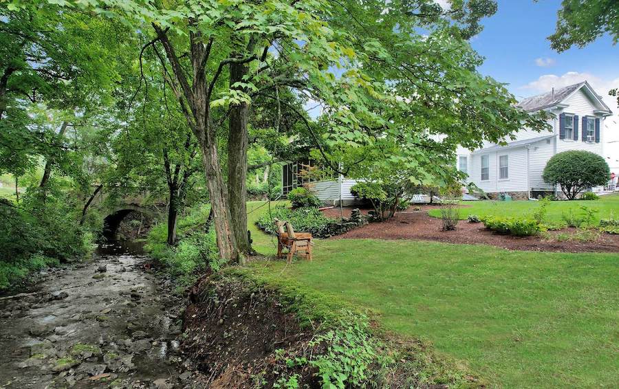 house for sale milford colonial backyard, side yard and vandermark creek