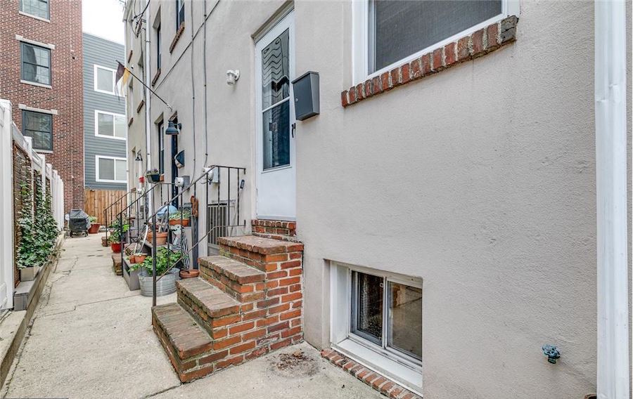 house for sale queen village gated alley trinity front door