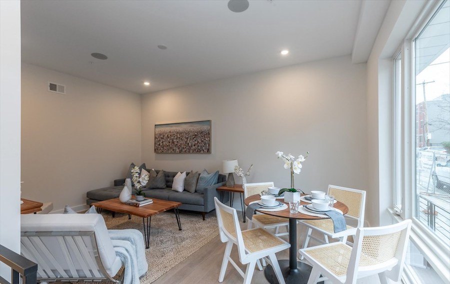 condo for sale francisville new construction bi-level living and dining area