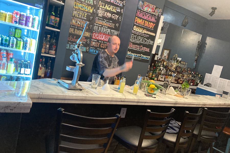 a fiume bartender behind the new bar top in fiume in west philly