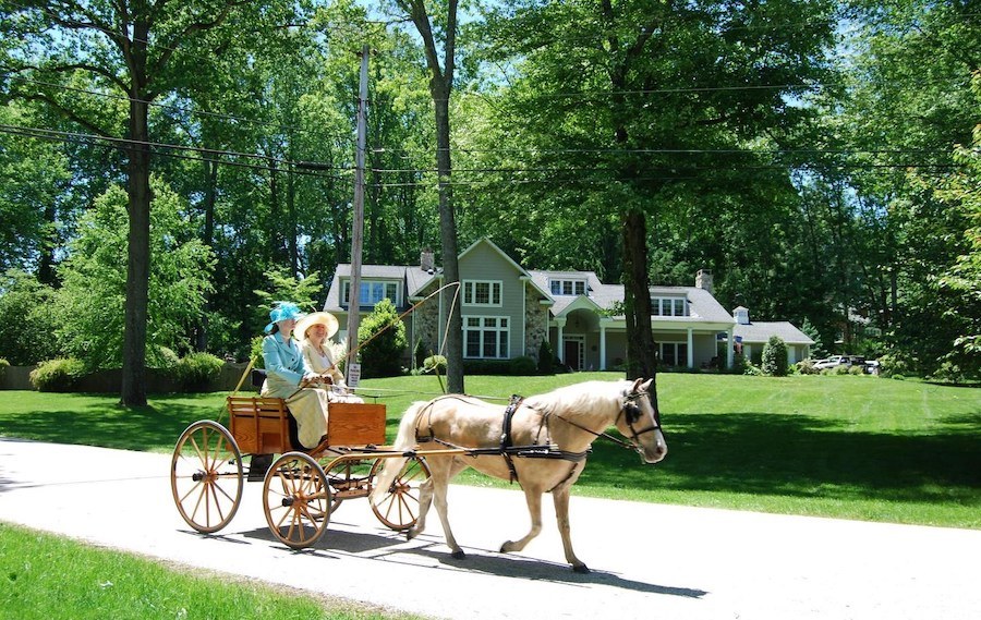 devon horse show parade in front of house