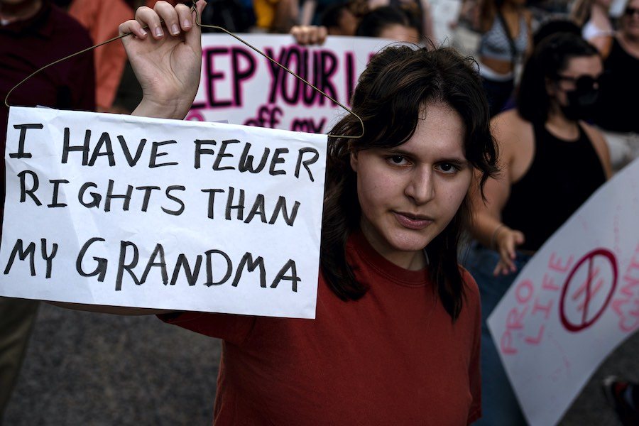 a woman protesting the change to abortion laws