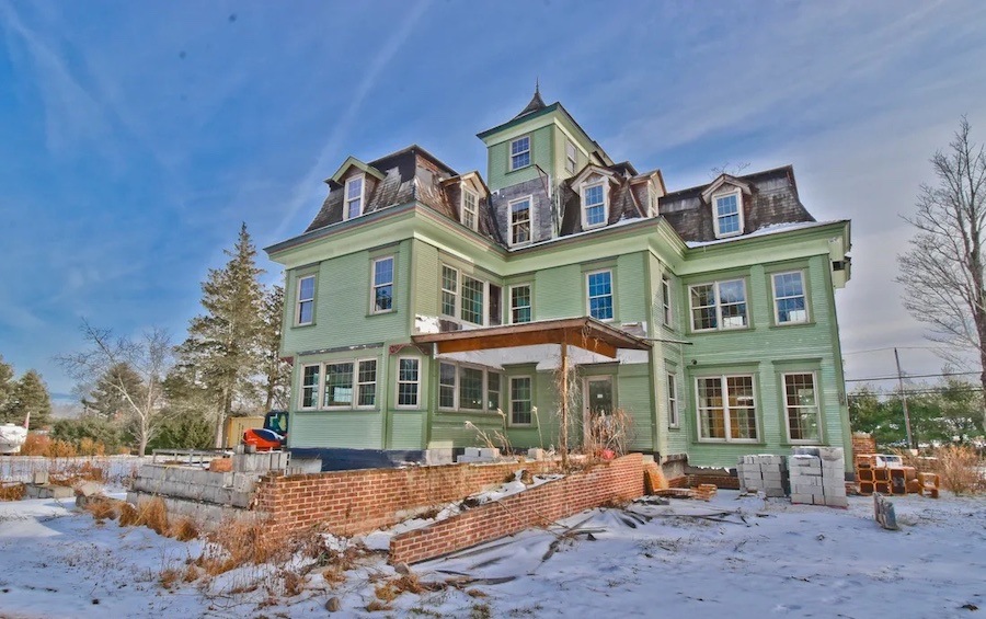 house for sale unfinished Cresco Victorian exterior rear