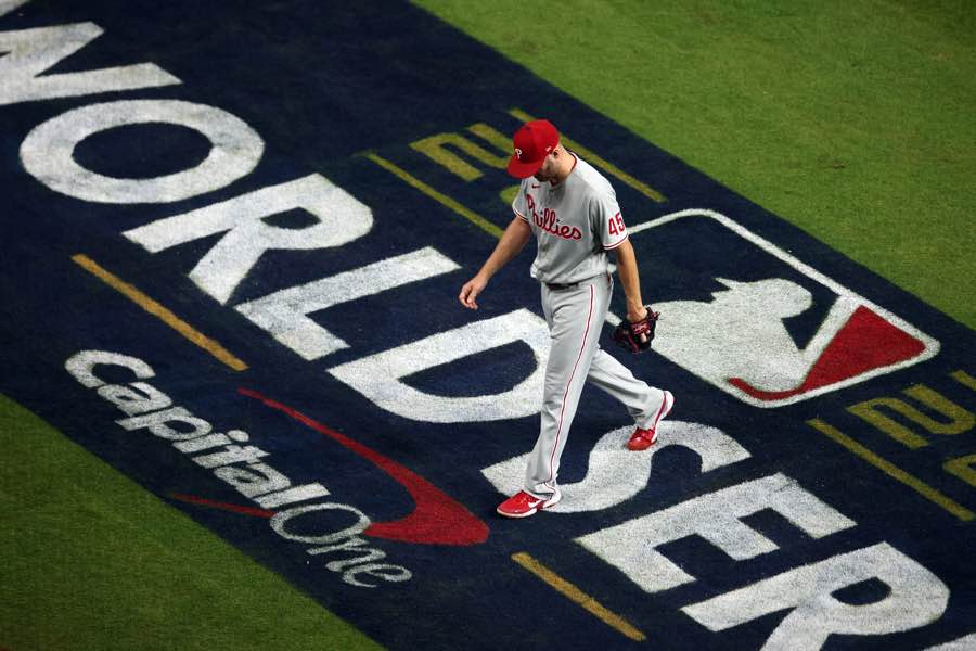 Zack Wheeler walks off the field in game two of the World Series