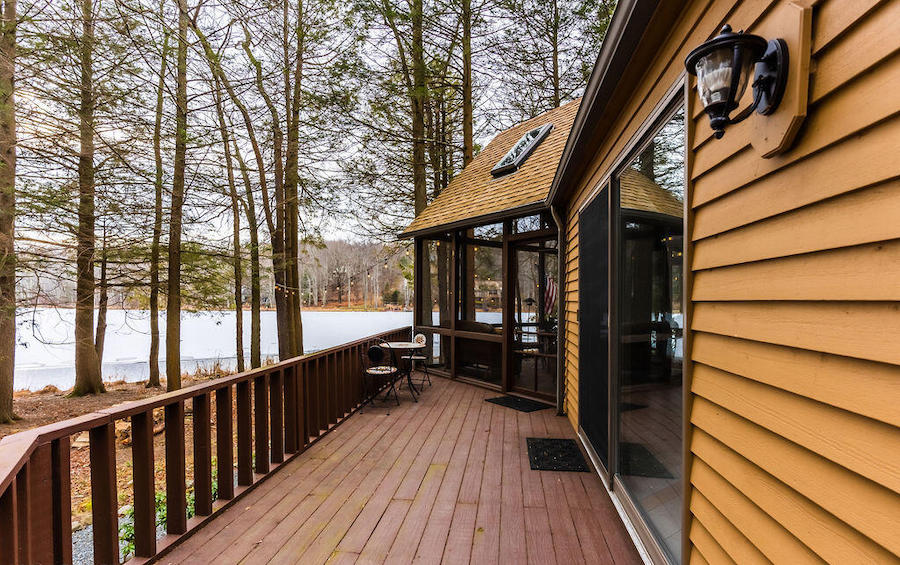 lake ariel lakefront contemporary house for sale living-room deck