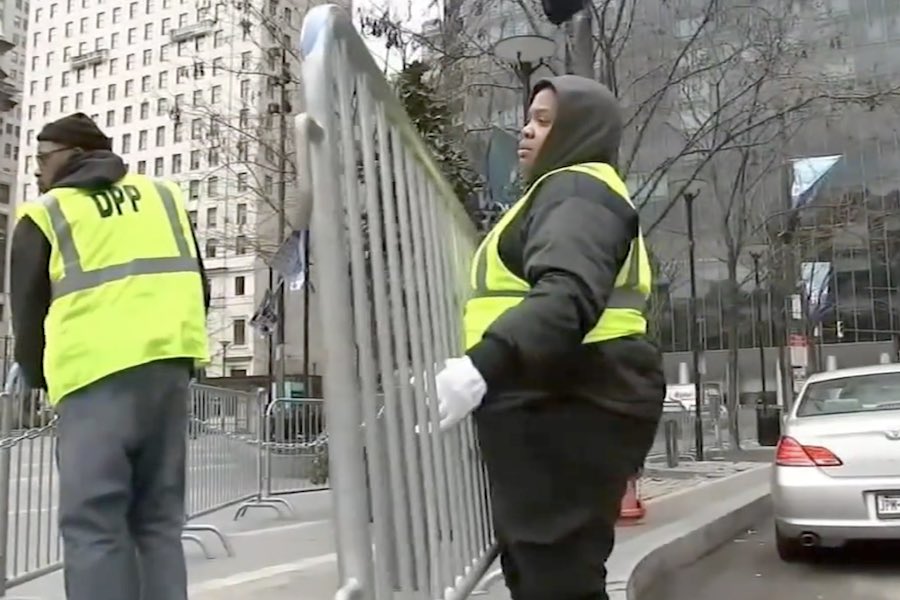 a city worker installs barricades in advance of Sunday's Philadelphia Eagles NFC Championship game
