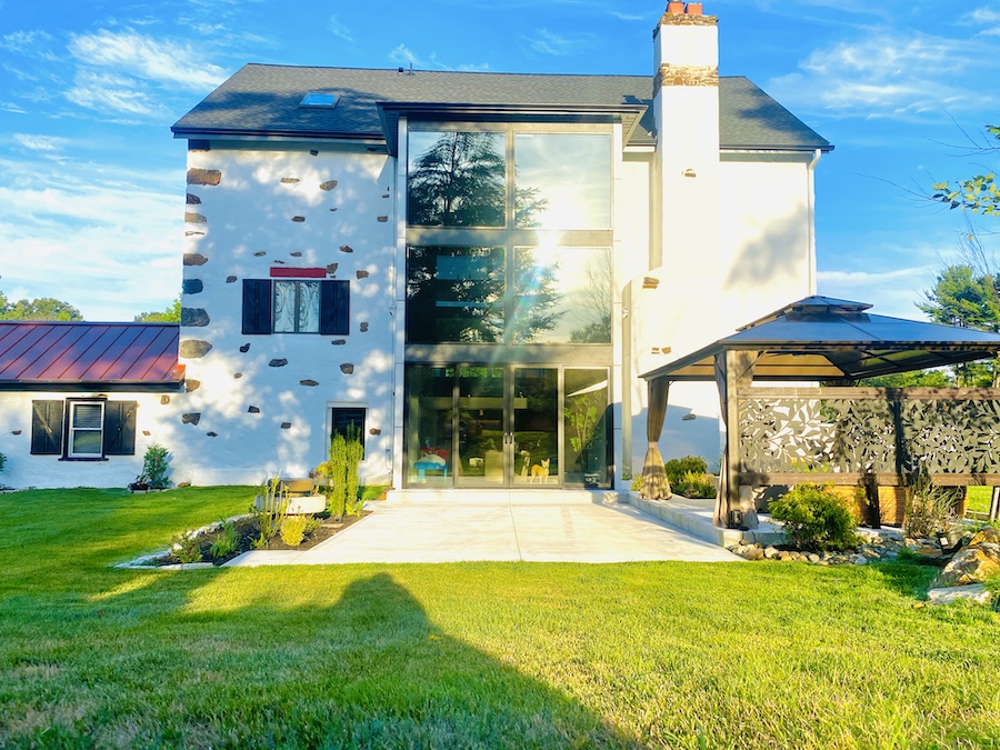 house for sale media converted barn exterior rear and backyard
