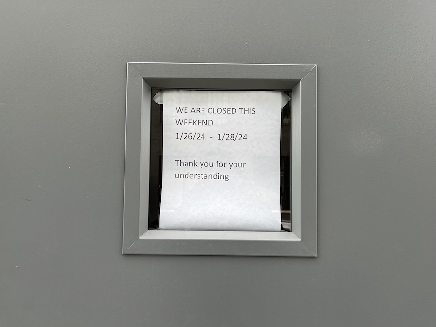 A sign on the door of Say No More bar in Kensington on Sunday