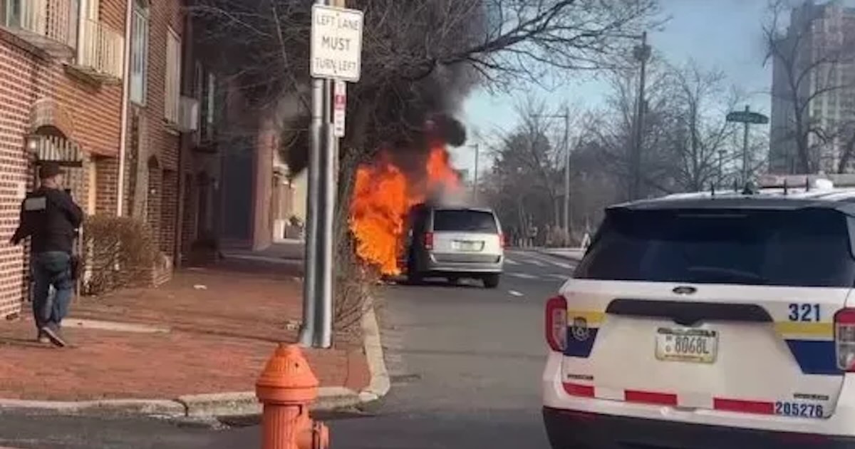 An ICE van on fire in Philadelphia on Tuesday.