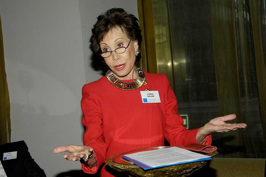 Carol Saline at a podium