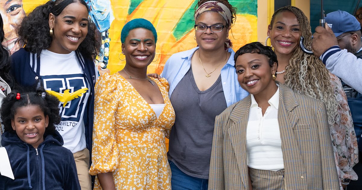Quinta Brunson, Philadelphia teachers, a student, and others outside Andrew Hamilton School in Philadelphia